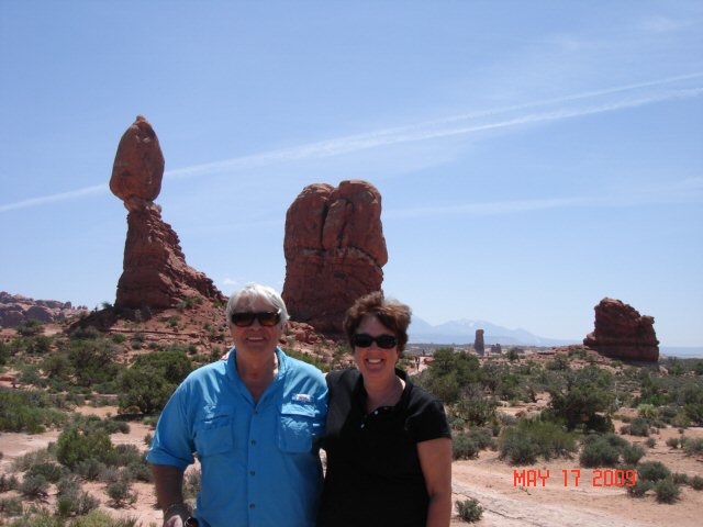 Standing in front of the balanced rock.