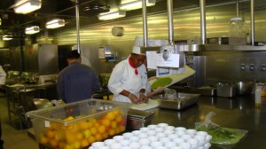 Cook working hard in the galley